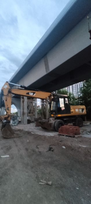 Услуга Экскаватор в Астане