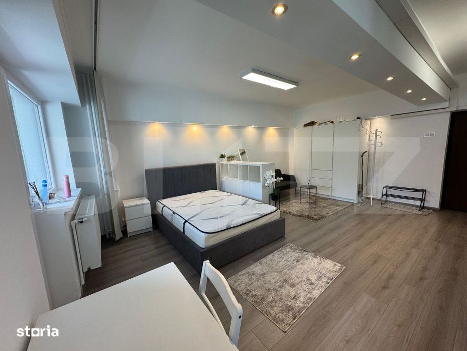 Garsoniera de inchiriat, 38 mp, open space, centrala proprie, Calea Bu