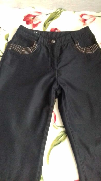 Продам новые болоньевые брюки