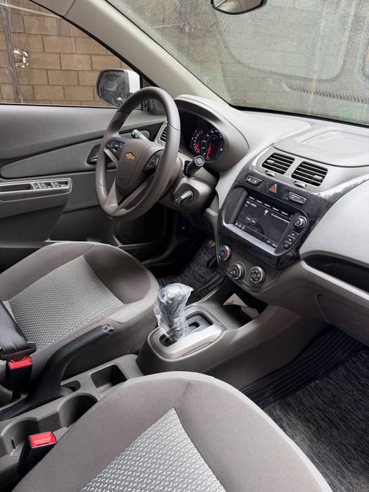 Продам свой автомобиль Chevrolet Cobalt а/т 2026 г/в. Цвет белый.