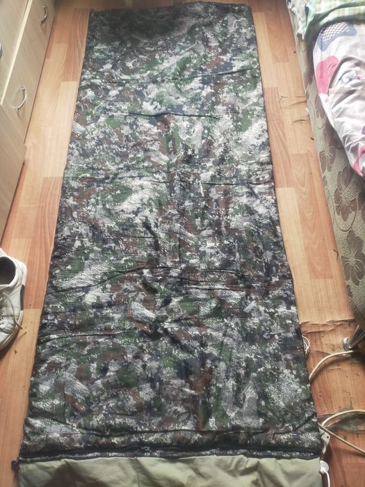 Спальный мешок .