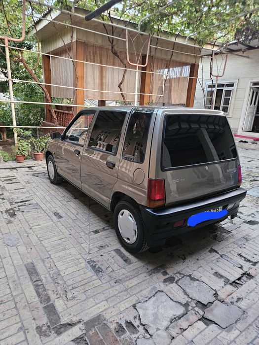 2000 йил тико тозз
