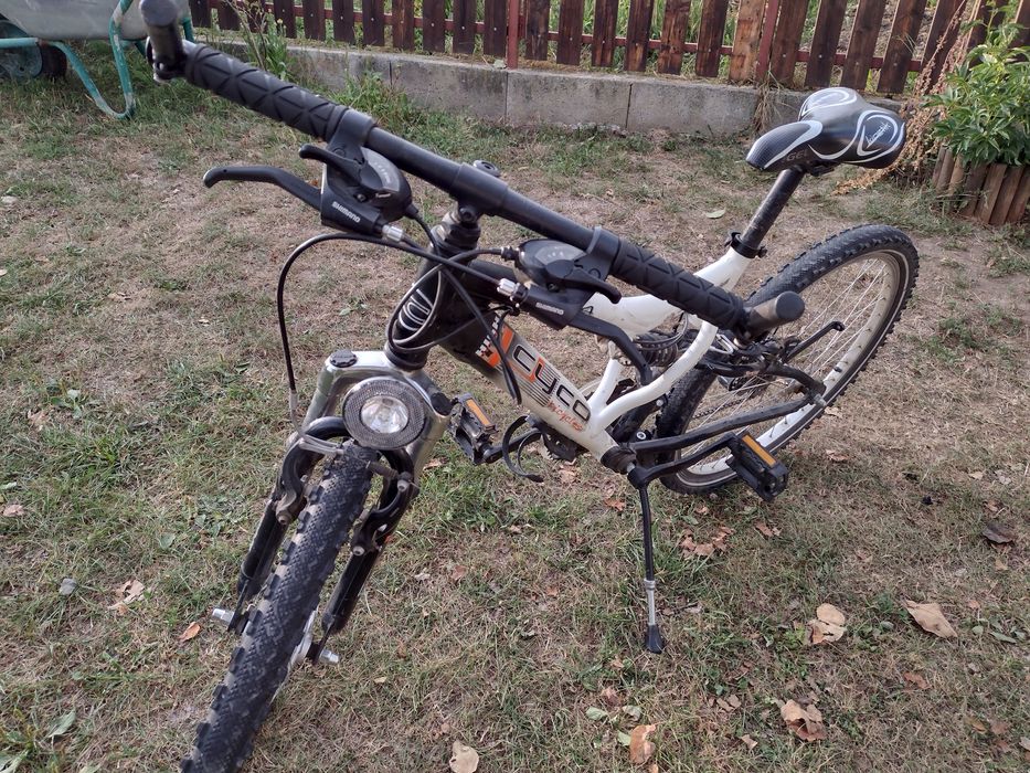 Vând bicicleta suspensie roti 24