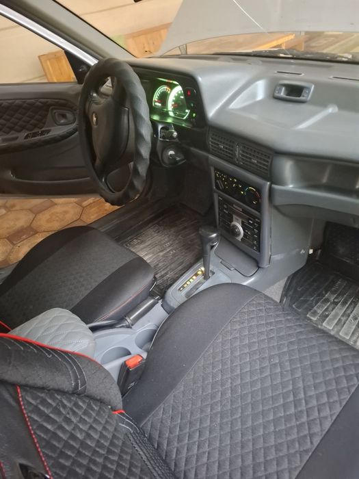 Нексия 1 автомат йили 2004 кам юриган эзилмаган кузов тетик