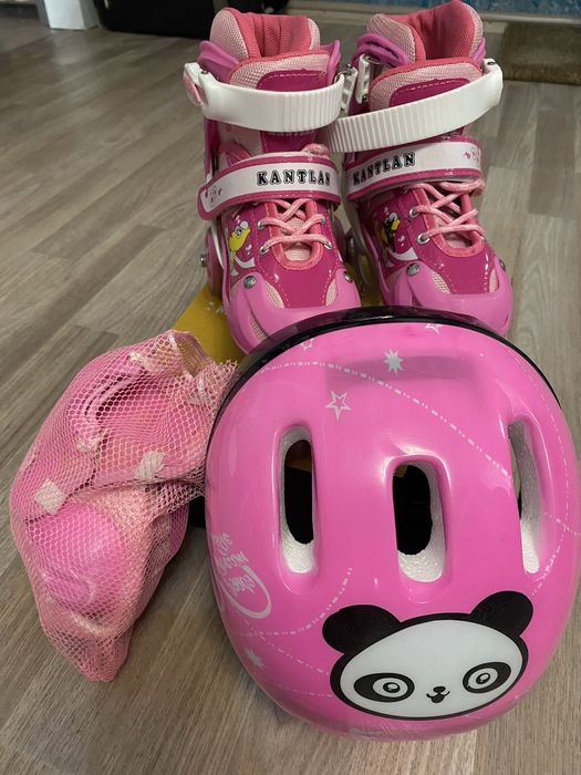 Роликовые коньки