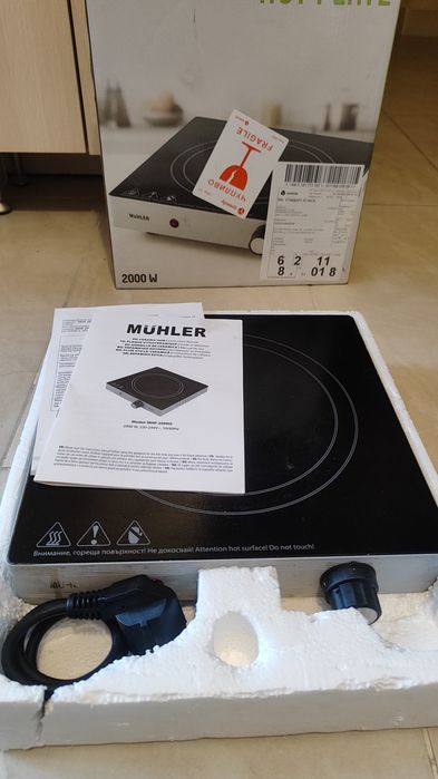 Керамичен котлон Muhler MHP-2099IS, 2000 W - работещ.