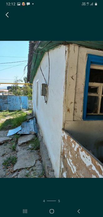 Продам дом возле центрального базара