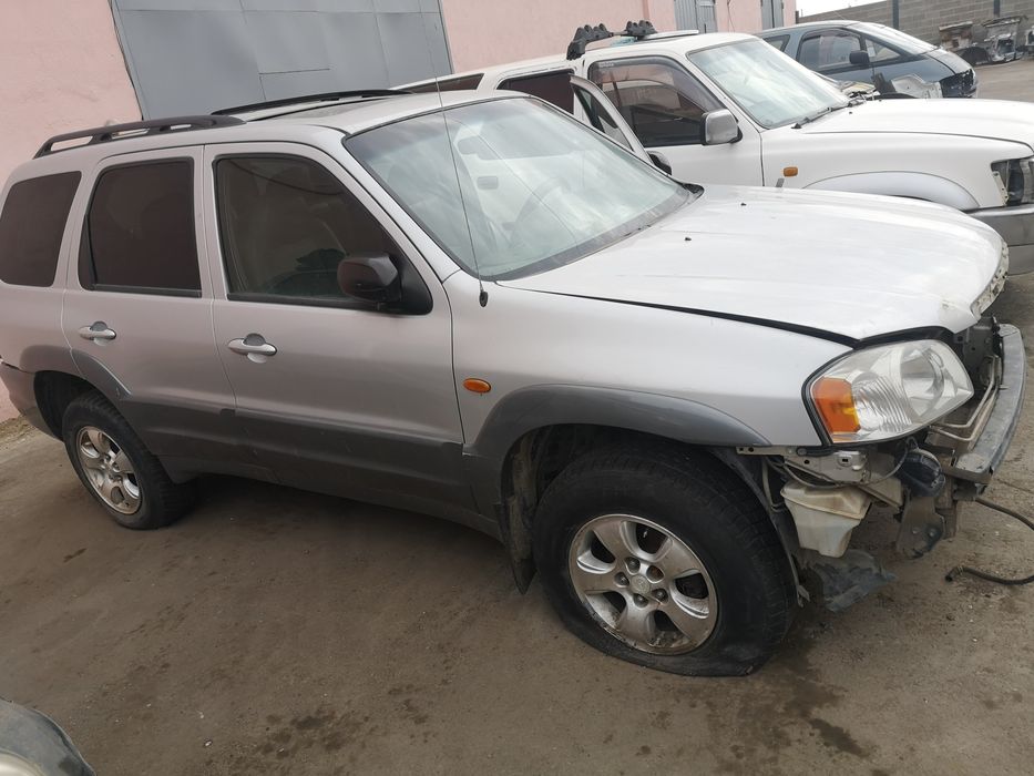 Мазда трибут по запчастям