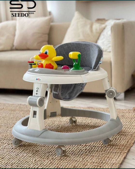 Даставка бесплатная. Детский ходунки