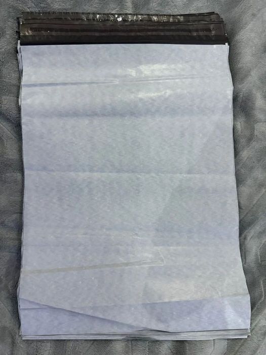 50 pungi albe pentru curierat