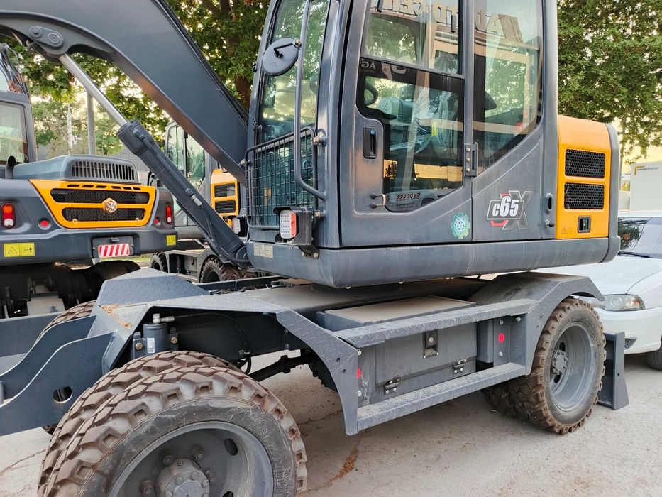 Колесный экскаватор   C65ECO