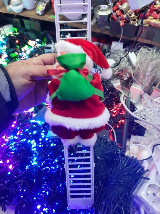 Vând moși Crăciun cățărători și urcători pe scara