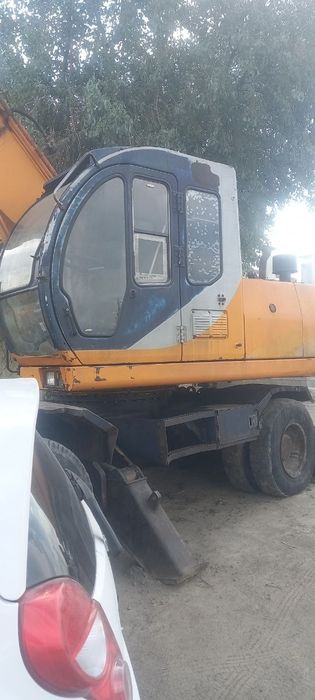 Экскаватор отличным состоянии
