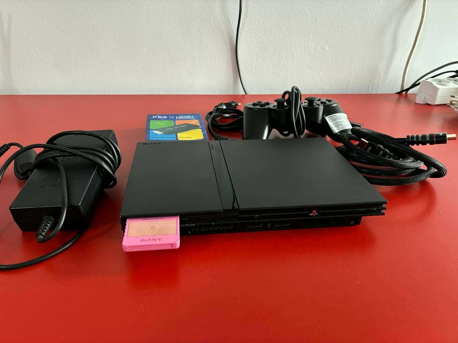 Vand PlayStation 2 Slim modabilă + FIFA 2008 & PES 2008
