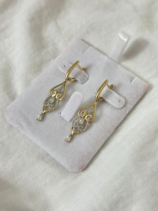 Золотые серьги перстень