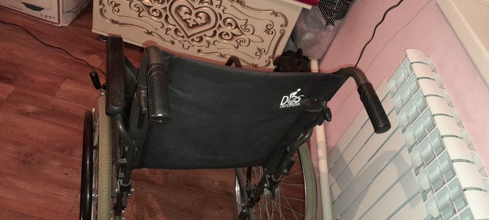 Инвалидный коляска
