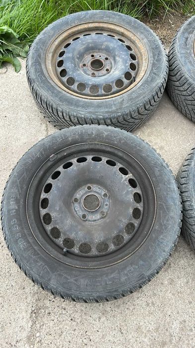 Set jante tabla cu capace roti 5x112 anvelope 205/55R16 M+S Passat B7