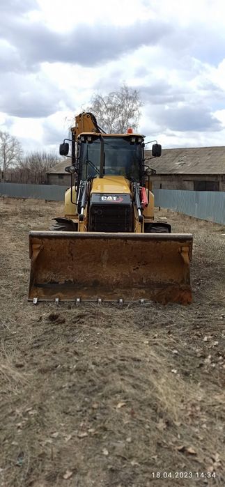 Экскаватор погрузчик 3в1 сат428