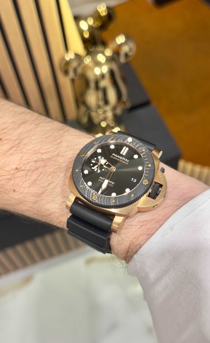 panerai luminor submersible gold/black