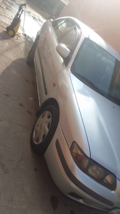 Мазда 626 птичка