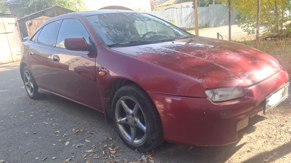 Продам машину Mazda 323