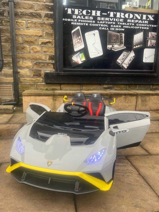 Masinuta electrica pt. copii Lamborghini Huracan STO 12V 2x40W