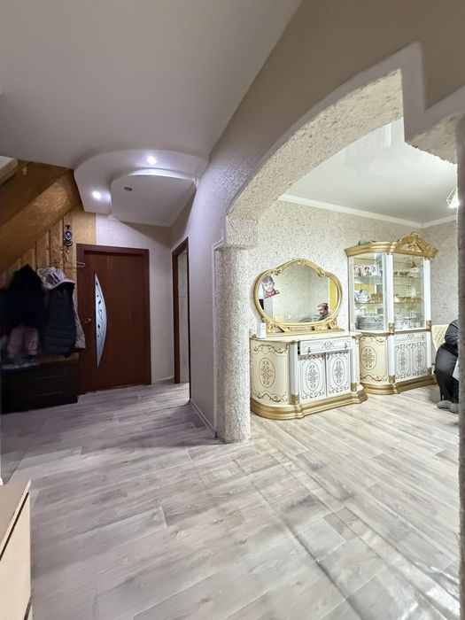 Продается мансардный дом в городе