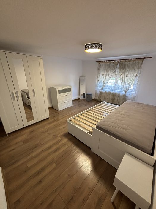 Apartament la casa cu curte