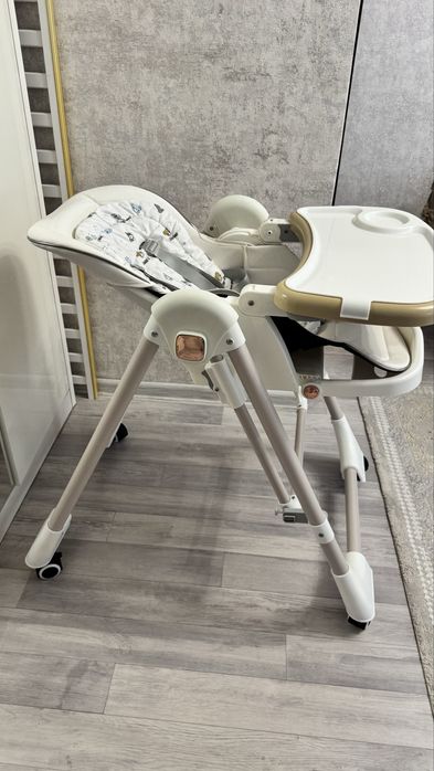 Стульчик для кормления с качелью