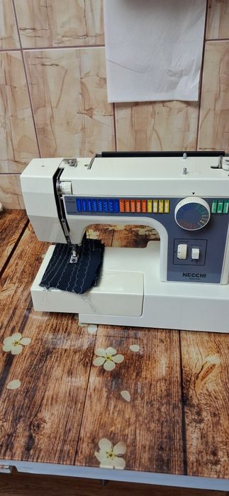 Masina de cusut nechi 559