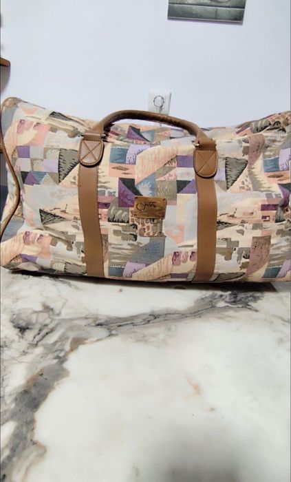 Geanta de voiaj cu manere din piele