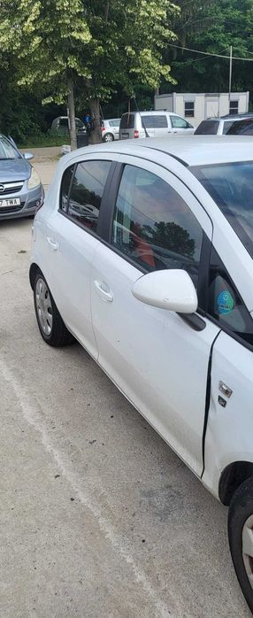 Usa stanga / drepta fata Opel Crosa D  - Pret per bucata