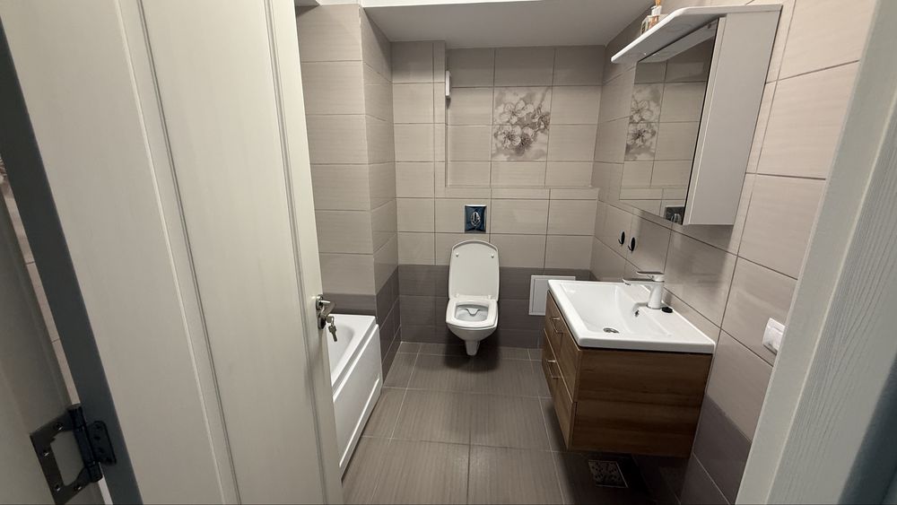 Vand apartament cu loc de parcare in interior, cartoer Fiald