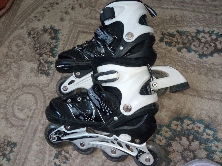 Роликовые коньки