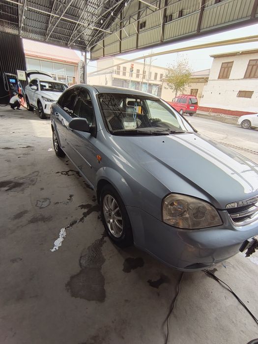 Лачетти 1.8 2013 газ