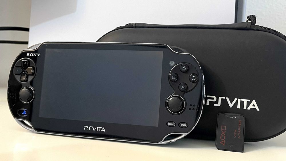 PS Vita OLED PCH-1104 modată - card 64GB, SD2Vita + husă