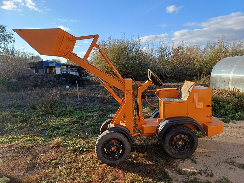 Мини трактор погрузчик