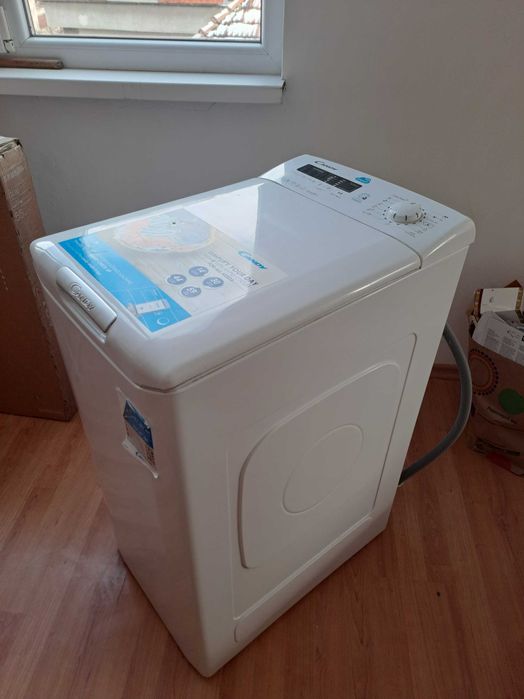 Пералня Candy с горно пълнене