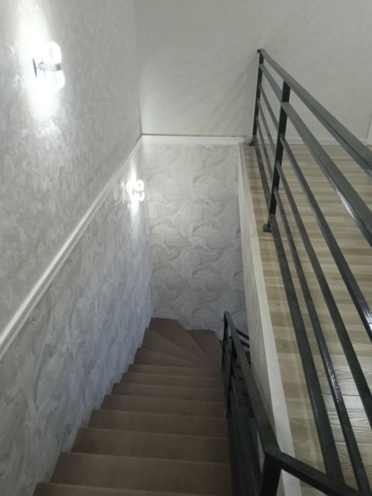 Продается двух этажный дом в махалле Мажнунтол