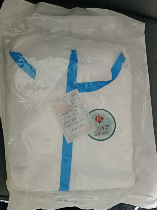 Защитный комбинезон одноразовый