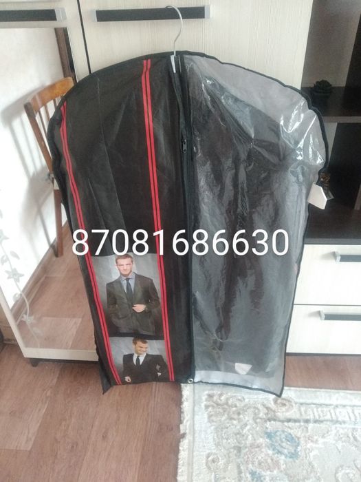 Продам черный костюм