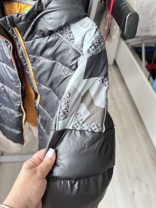 Пуховик бенетон