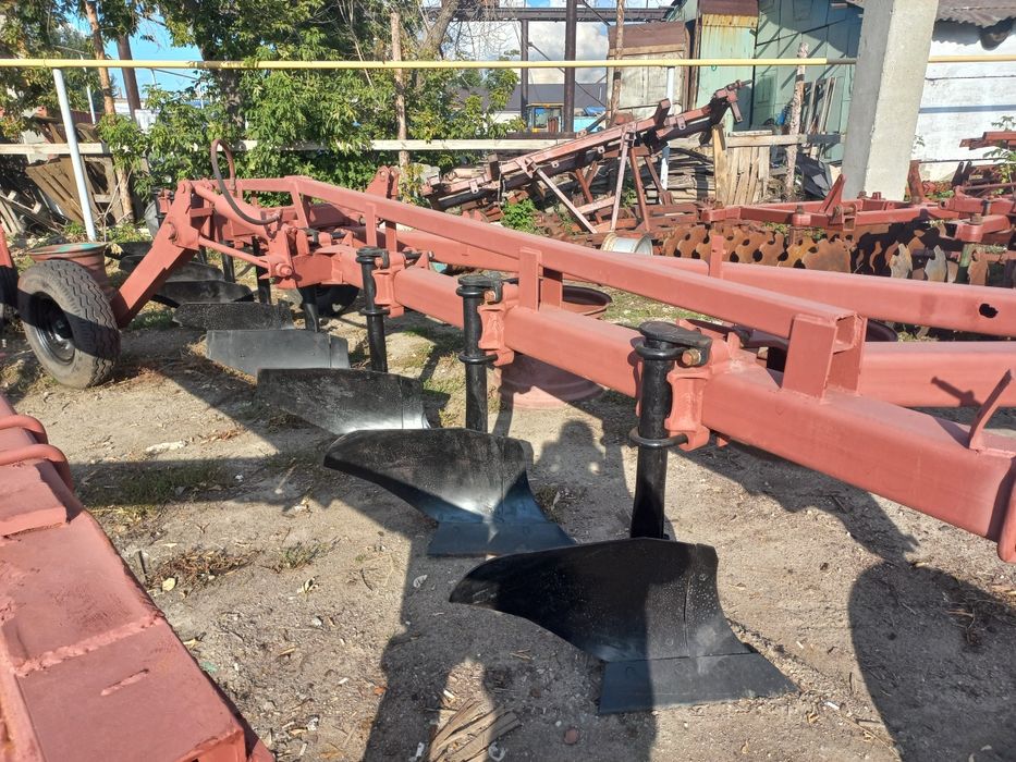 Плуг 9корпусный прицепной