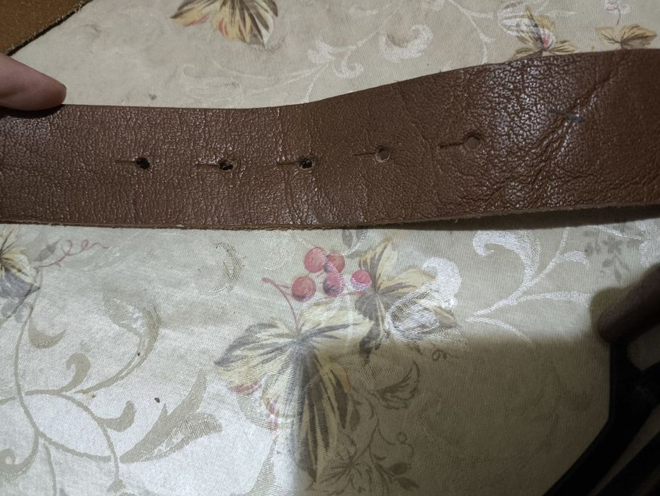 Кожаный ремень .