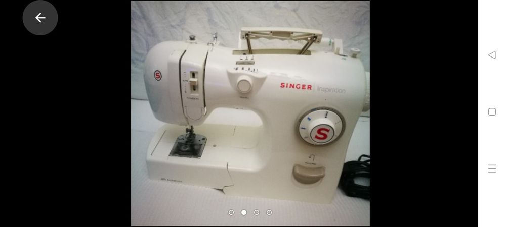 Mașina cusut singer.