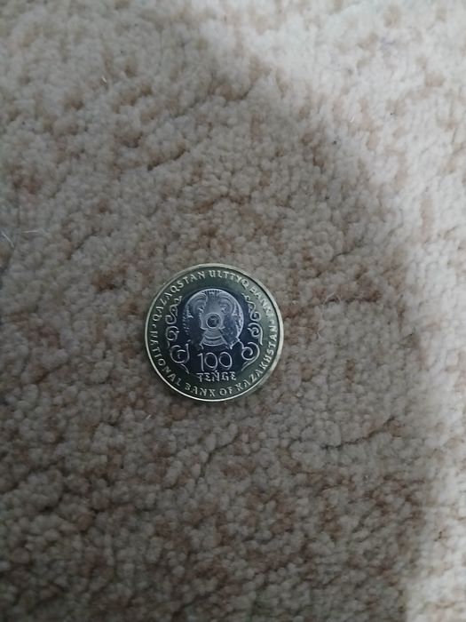 Продам монетка 100 тг 30 лет