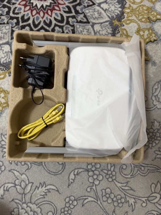 Продам роутер TP-LINK EC220-G5