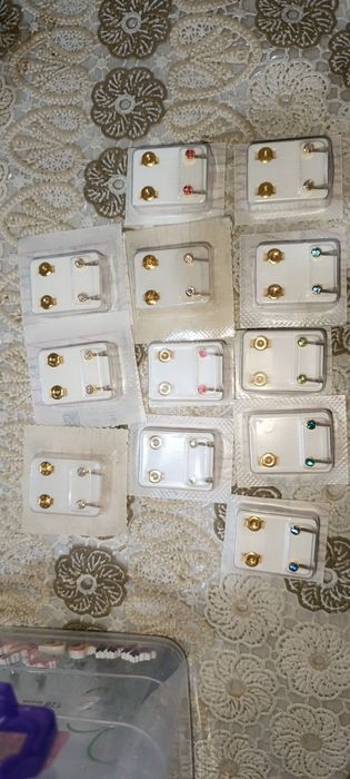 Прокалывание ушей пистолетом от Американского производителя