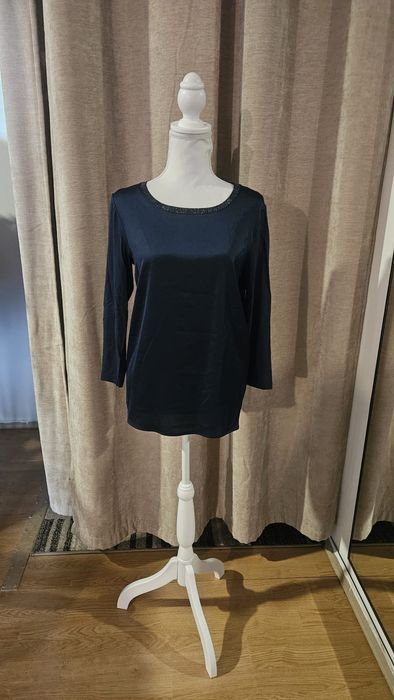 Bluza dama noua, Oltre
