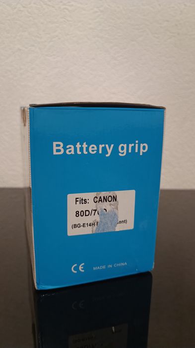 Продам батарейный грип BG-E14H